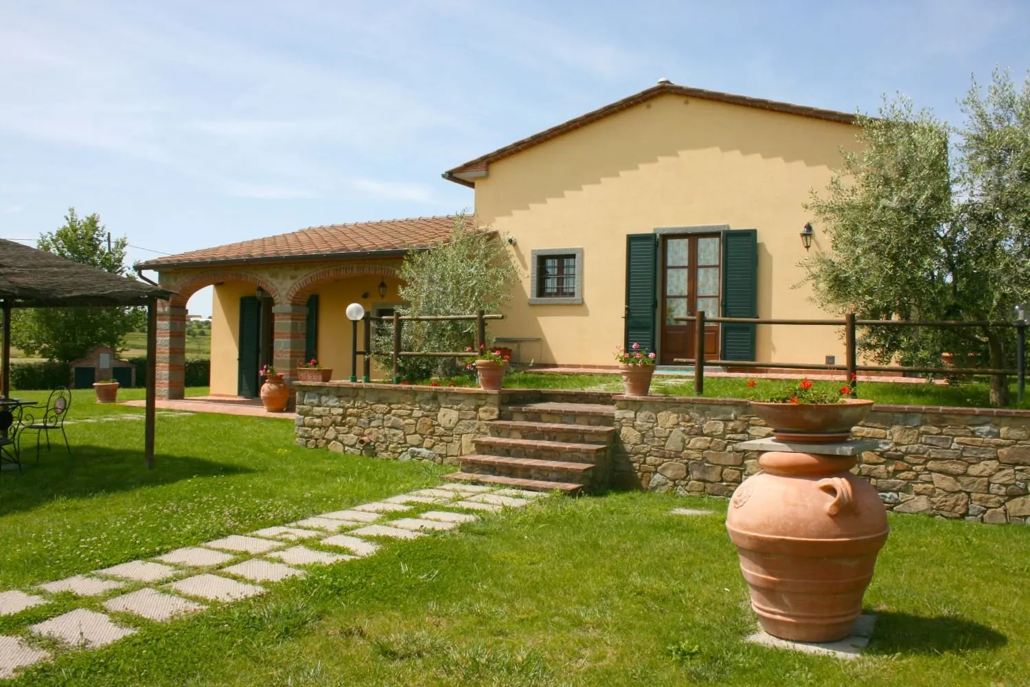 Podere Marcigliano - tuin met huis